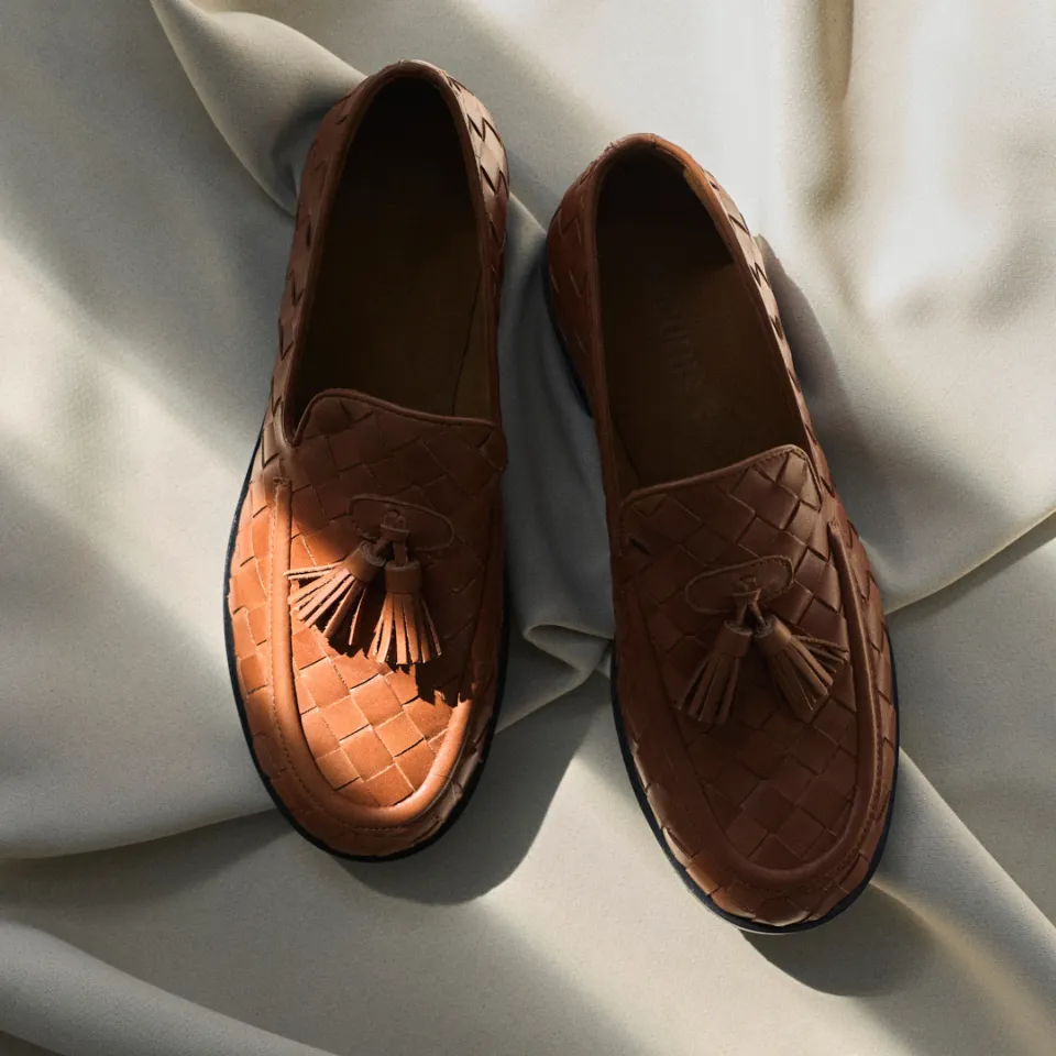 Angulus mocassin tressé à pompons en cuir